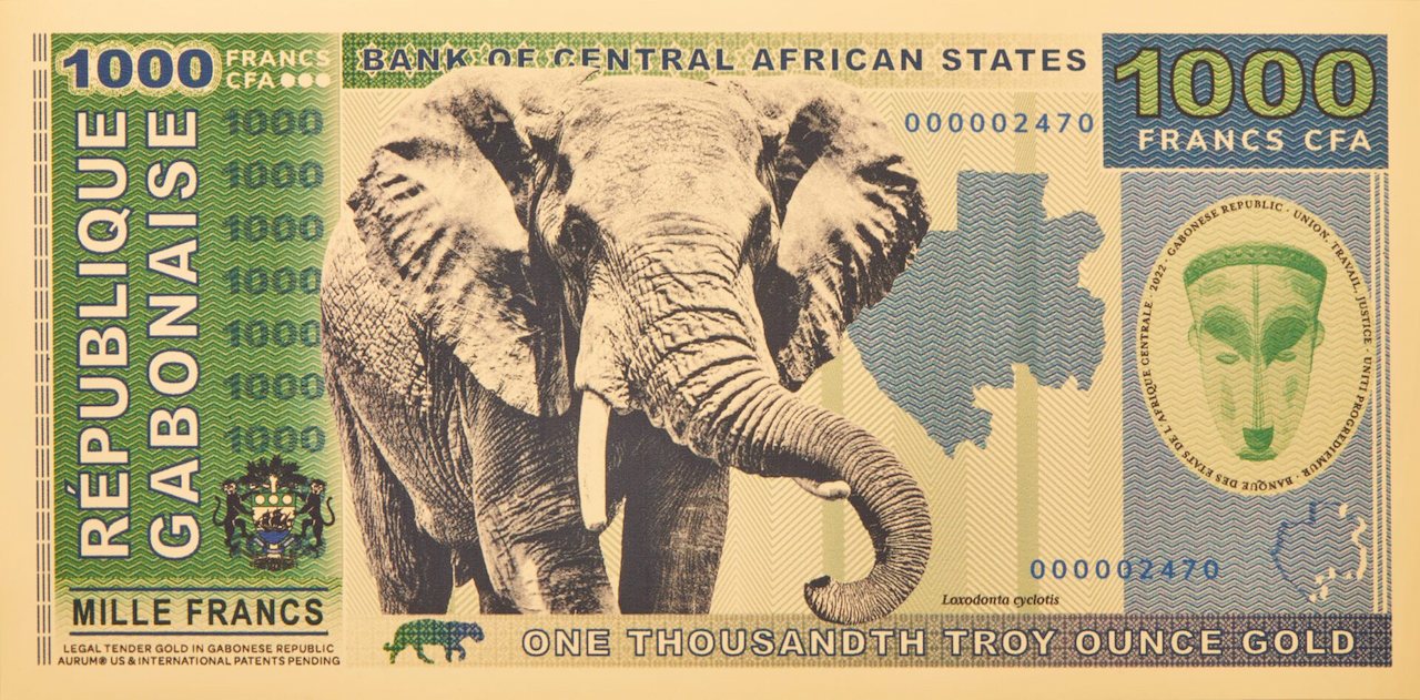 Gold backed legal tender 1000 francs cfa republic of Gabon 100mg 24k gold aurum elephant bill front side