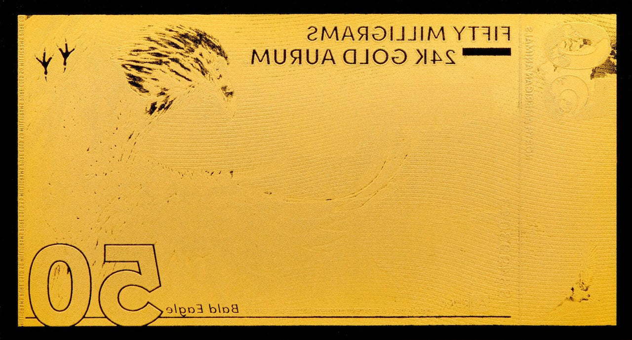 the 50mg 24k gold north american bald eagle gold bill shown reverse side