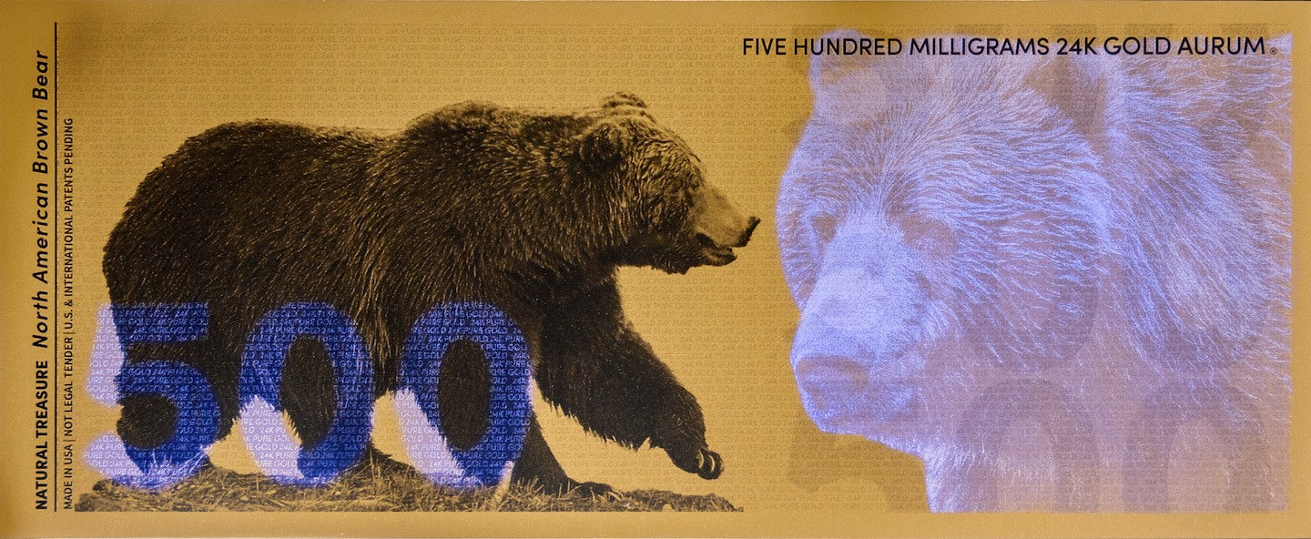 reverse of 500mg gold aurum brown bear bill showing the uv designs