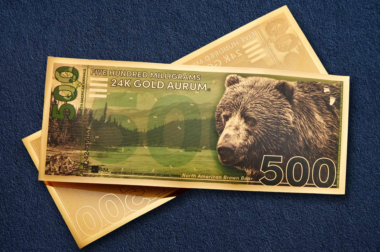 the best 500mg gold bullion product on the market a 24k gold eagle aurum shown with obverse over reverse