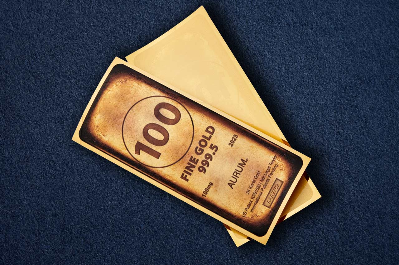 100 milligrams of 24k pure gold in an aurum with a classic gold bar design shown obverse over reverse