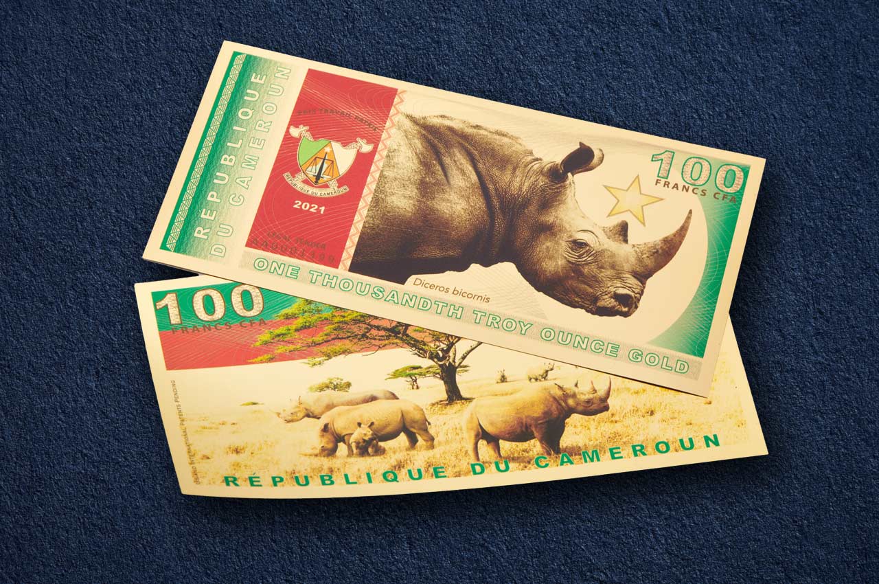 republique du cameroun 100 francs cfa bill special edition aurum gold backed currency showing obverse and reverse with a rhino prominent in the design