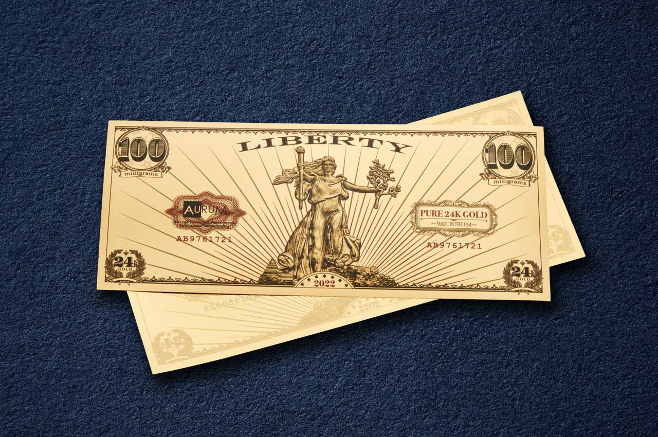 the 100mg 24k pure gold st gauden liberty aurum bill shown obverse over reverse